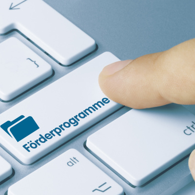 Computertastatur mit Taste "Förderprogramme".