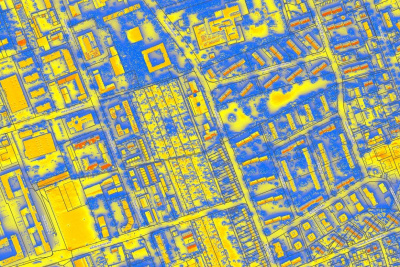 Solarkataster Hessen, Wärmebildaufnahme einer urbanen Fläche von oben in gelb, rot und blau.